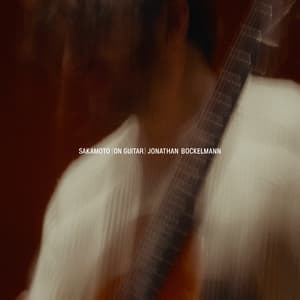 Sakamoto (On Guitar)